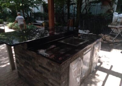 black granite outdoor kitchen island | Stone saver Inc